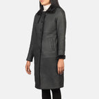 Women's Alina black long shearling leather coat with fur collar and fitted sleeve, angled 