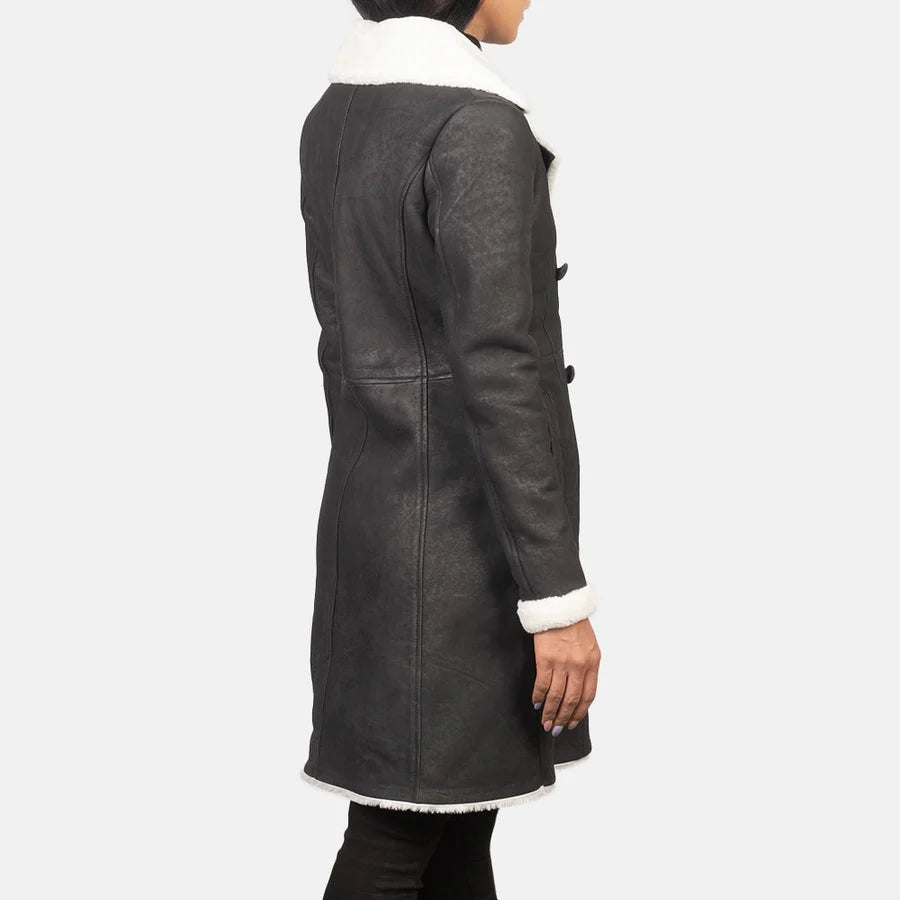Women's Amie black distressed shearling leather coat with fitted sleeve and white fur hem trim