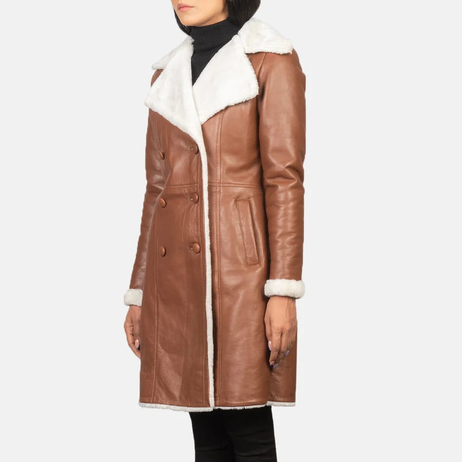 Women's Amie brown shearling leather coat with wide white fur lapels and shearling trim cuffs, angled
