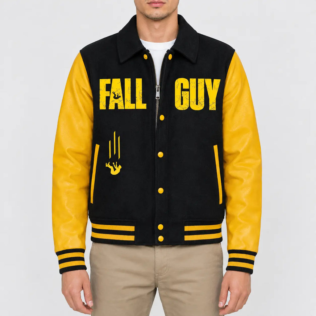 Men’s black wool varsity jacket with yellow leather sleeves, shirt collar, snap button front and striped rib hem