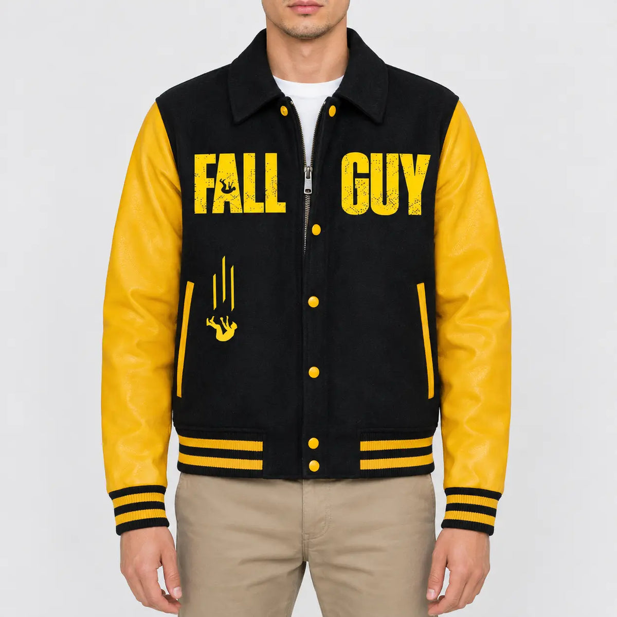 Men’s black wool varsity jacket with yellow leather sleeves, shirt collar, snap button front and striped rib hem