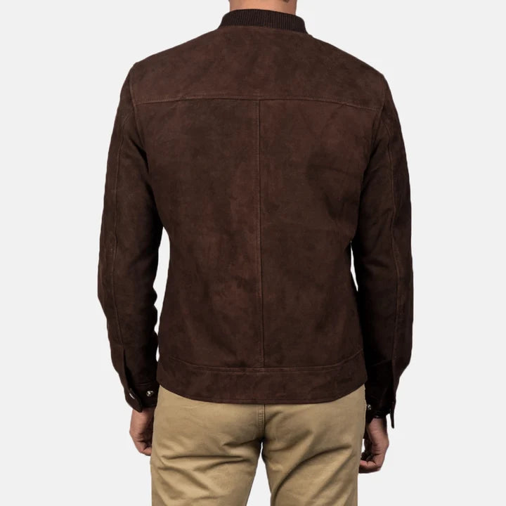 Back view of a man wearing a dark brown mocha suede bomber jacket.