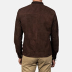 Back view of a man wearing a dark brown mocha suede bomber jacket.