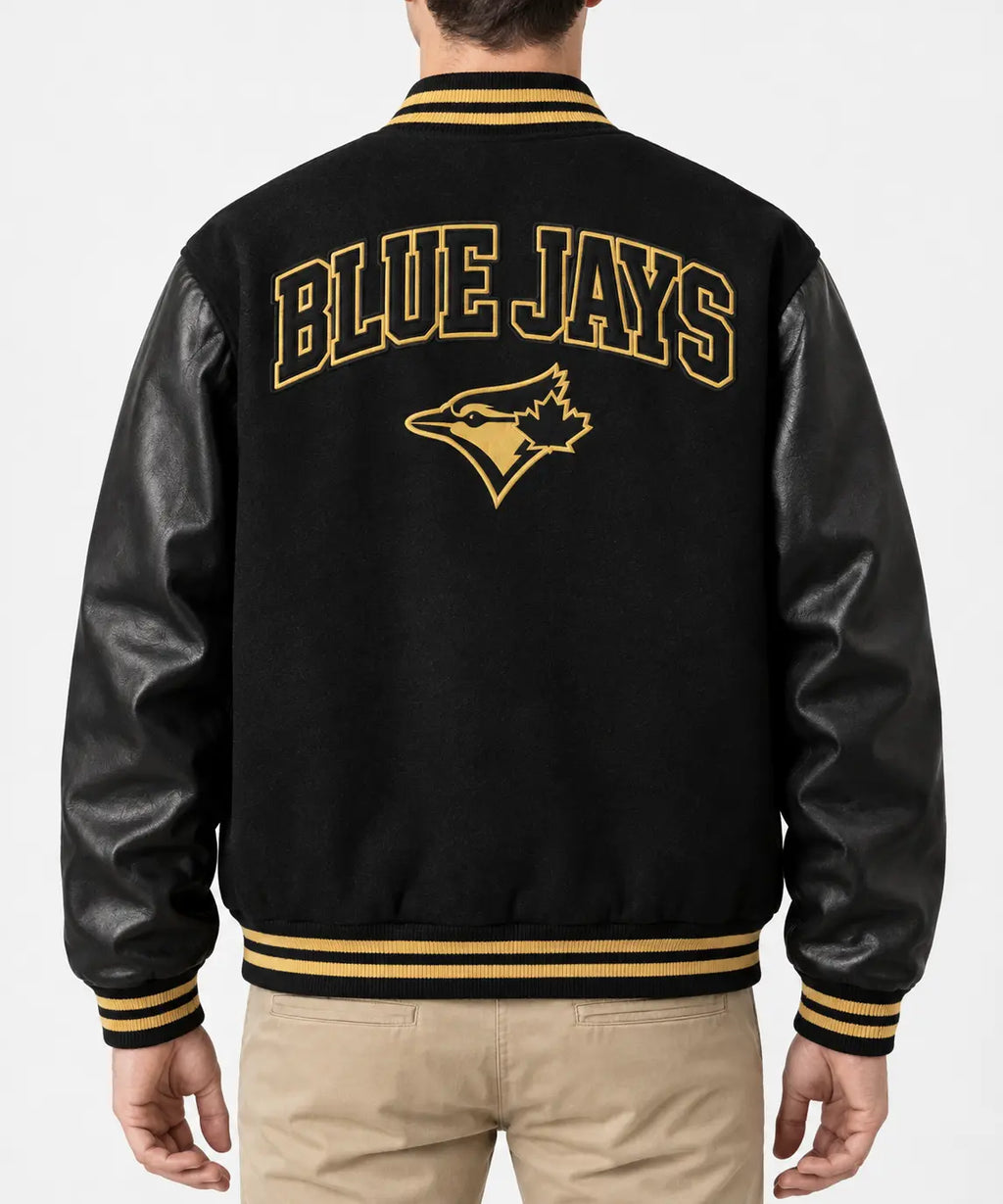 Men’s black wool blend varsity jacket with leather sleeves and gold striped rib trim