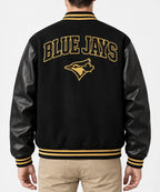 Men’s black wool blend varsity jacket with leather sleeves and gold striped rib trim