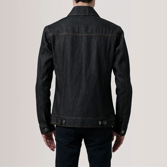 Close up view of side pocket and contrast stitching on Conard Faded Black Denim Trucker Jacket