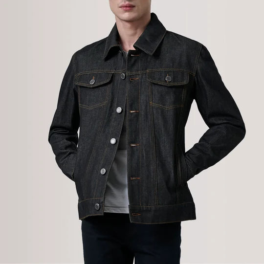 Front view of a man wearing buttoned Conard Faded Black Denim Trucker Jacket