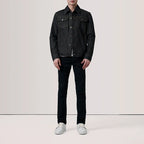 Front standing pose of male model in Conard Faded Black Denim Trucker Jacket