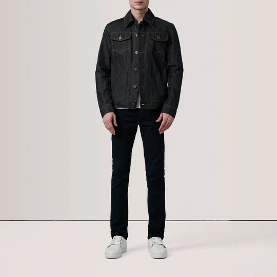 Front standing pose of male model in Conard Faded Black Denim Trucker Jacket