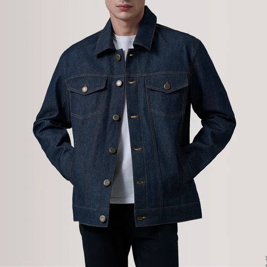 Front standing pose of male model wearing Conard Indigo Blue Denim Trucker Jacket