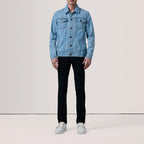 Model wearing Conard light blue denim trucker jacket with black jeans