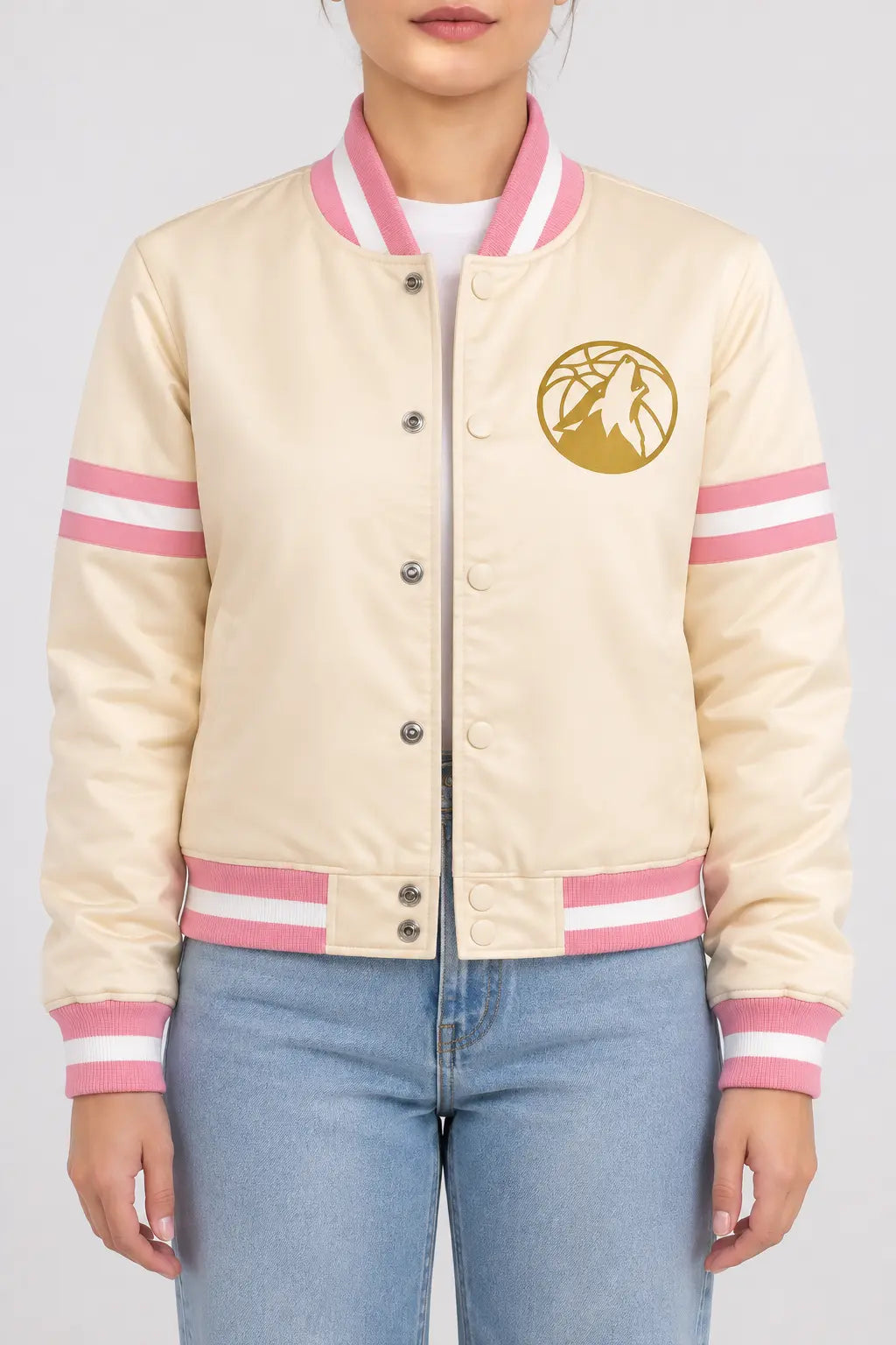 Women’s cream satin full-snap varsity jacket with pink and white striped rib trim and sleeve stripes