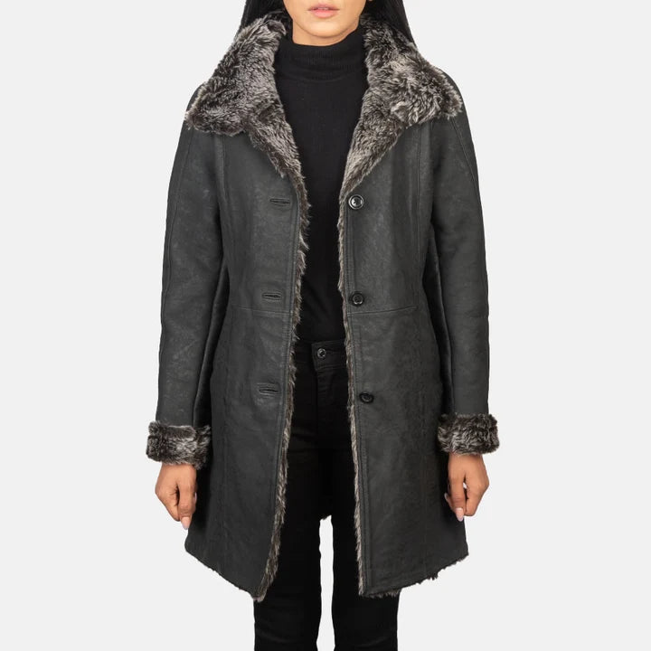 Women's Erica black distressed shearling coat with fur collar and mid-length hem, side view