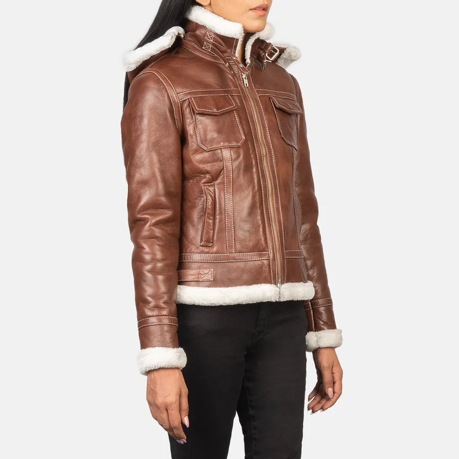 Women's FionaBrownHooded brown hooded shearling leather jacket with front zipper and shearling trim cuffs, angled front view