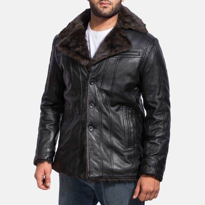 Men's Furcliff black leather coat worn closed with wide fur collar and slit chest pocket