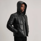 Men’s Gordon black hooded leather puffer jacket with padded sleeves, angled