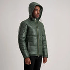 Men’s Gordon green leather puffer jacket with drawstring hood up, angled