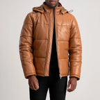 Men’s Gordon tan hooded leather puffer jacket worn open with quilted panels