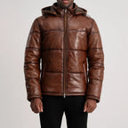 Men’s Gordon brown hooded leather puffer jacket zipped up with quilted panels