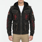 Men's Jurassic Park distressed black leather jacket featuring a large red and yellow back logo, red claw marks, sleeve patches.