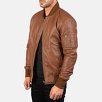 Brown leather bomber jacket close-up sleeve pocket detail