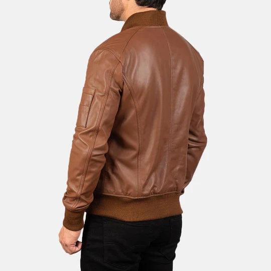 Brown leather bomber jacket zipper and stitching detail