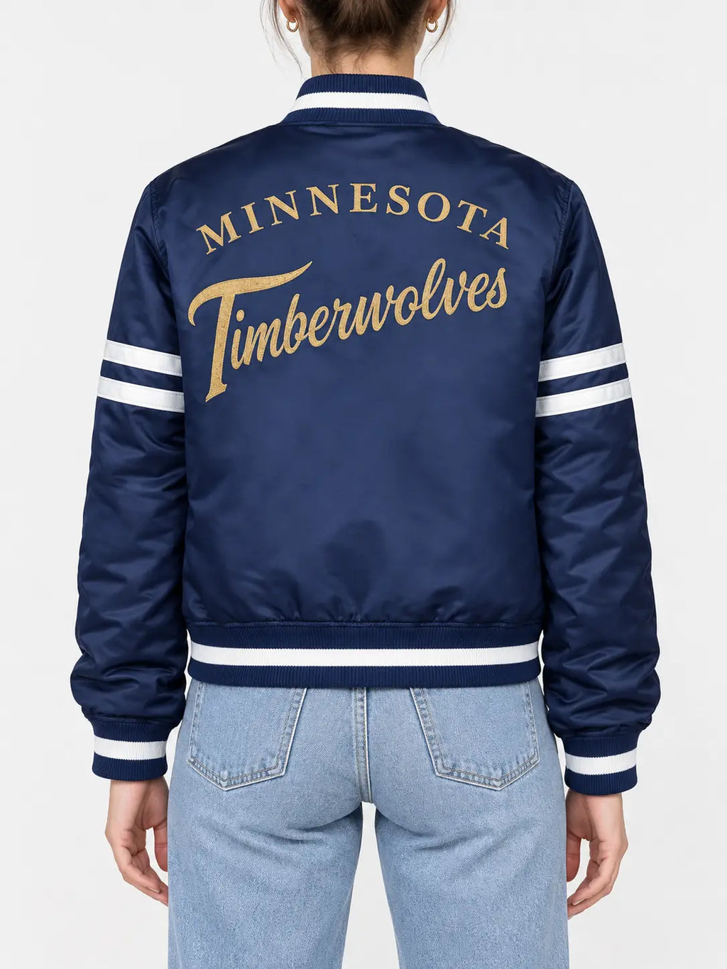 Women’s navy blue satin full-snap varsity jacket with gold script lettering across the back and white sleeve stripes