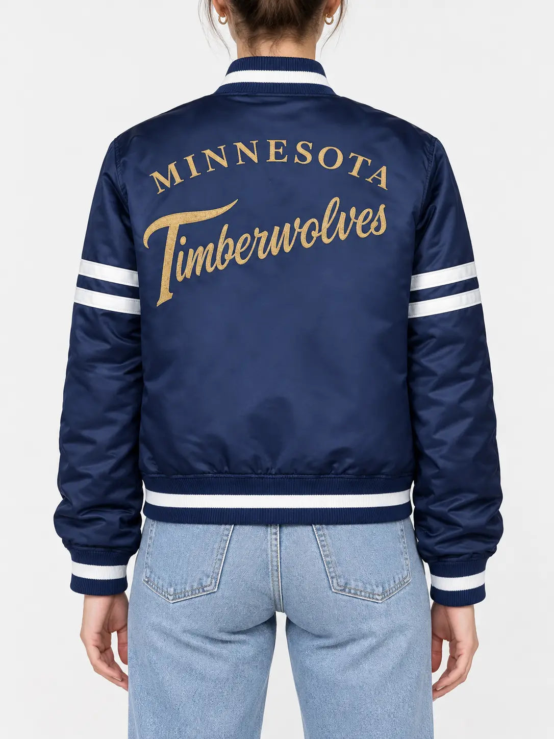 Women’s navy blue satin full-snap varsity jacket with gold script lettering across the back and white sleeve stripes