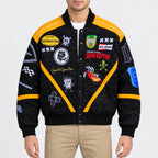 Men’s black twill racing bomber jacket with yellow panels, ribbed collar, snap-button front and embroidered patches