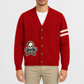 Men's red knit cardigan jacket featuring a skull and crossbones patch, cream sleeve stripes, button front closure
