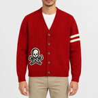 Men's red knit cardigan jacket featuring a skull and crossbones patch, cream sleeve stripes, button front closure