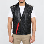 Men’s Leather vest with spiked shoulders, red contrast panel and asymmetrical front zipper, front view