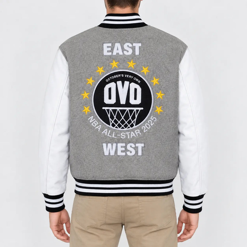 Men’s grey wool varsity jacket with white leather sleeves and striped rib collar, cuffs and hem