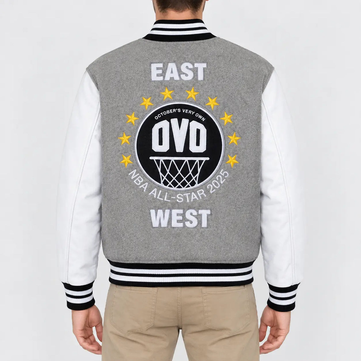 Men’s grey wool varsity jacket with white leather sleeves and striped rib collar, cuffs and hem