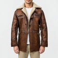 Men’s brown real leather shearling coat with fur lapel collar, loop button front and flap pockets