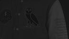 Men’s Grey Wool Varsity Jacket with White Leather Sleeves and Embroidered Patches