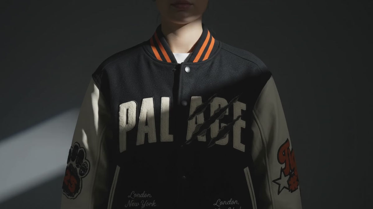 Women’s Black Wool Varsity Jacket with Cream Leather Sleeves and Chenille Patches