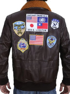 Men’s brown leather flight bomber jacket with faux shearling collar and rib knit cuffs and hem