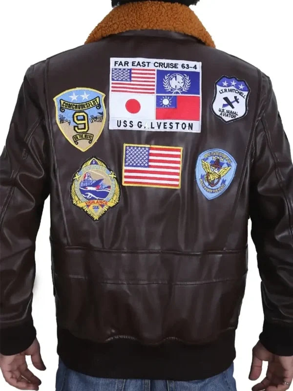 Men’s brown leather flight bomber jacket with faux shearling collar and rib knit cuffs and hem
